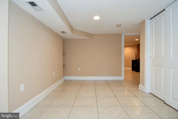 a front view of a building with street view