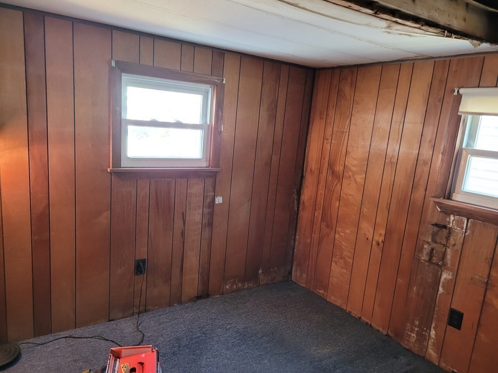 286 Newbury Street, Unit 75 Peabody, MA 01960 - Photo 14 of 18 an empty room with windows