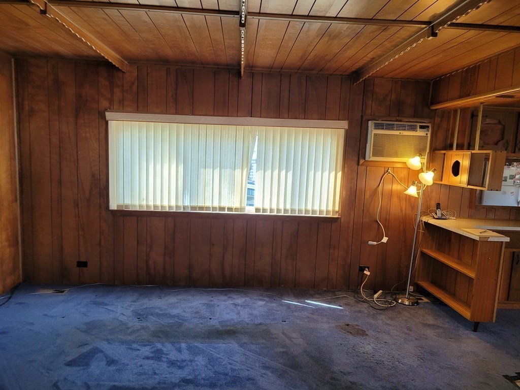 286 Newbury Street, Unit 75 Peabody, MA 01960 - Photo 16 of 18 a view of room with furniture and a window