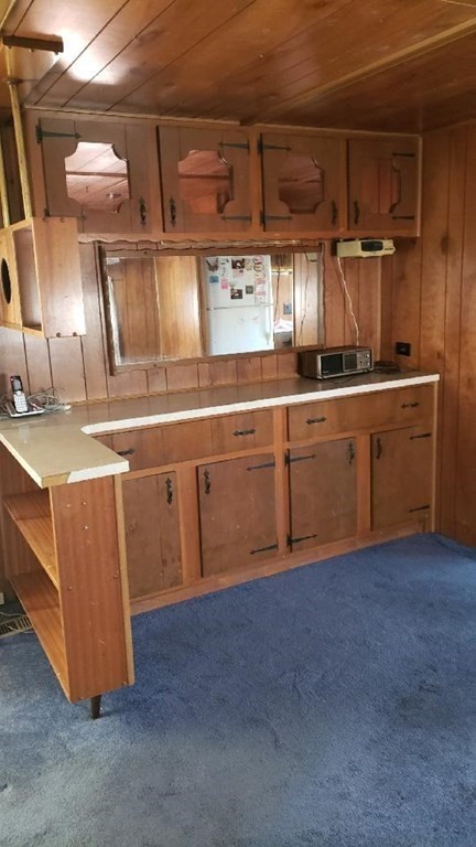 286 Newbury Street, Unit 75 Peabody, MA 01960 - Photo 3 of 18 a kitchen with sink and cabinets