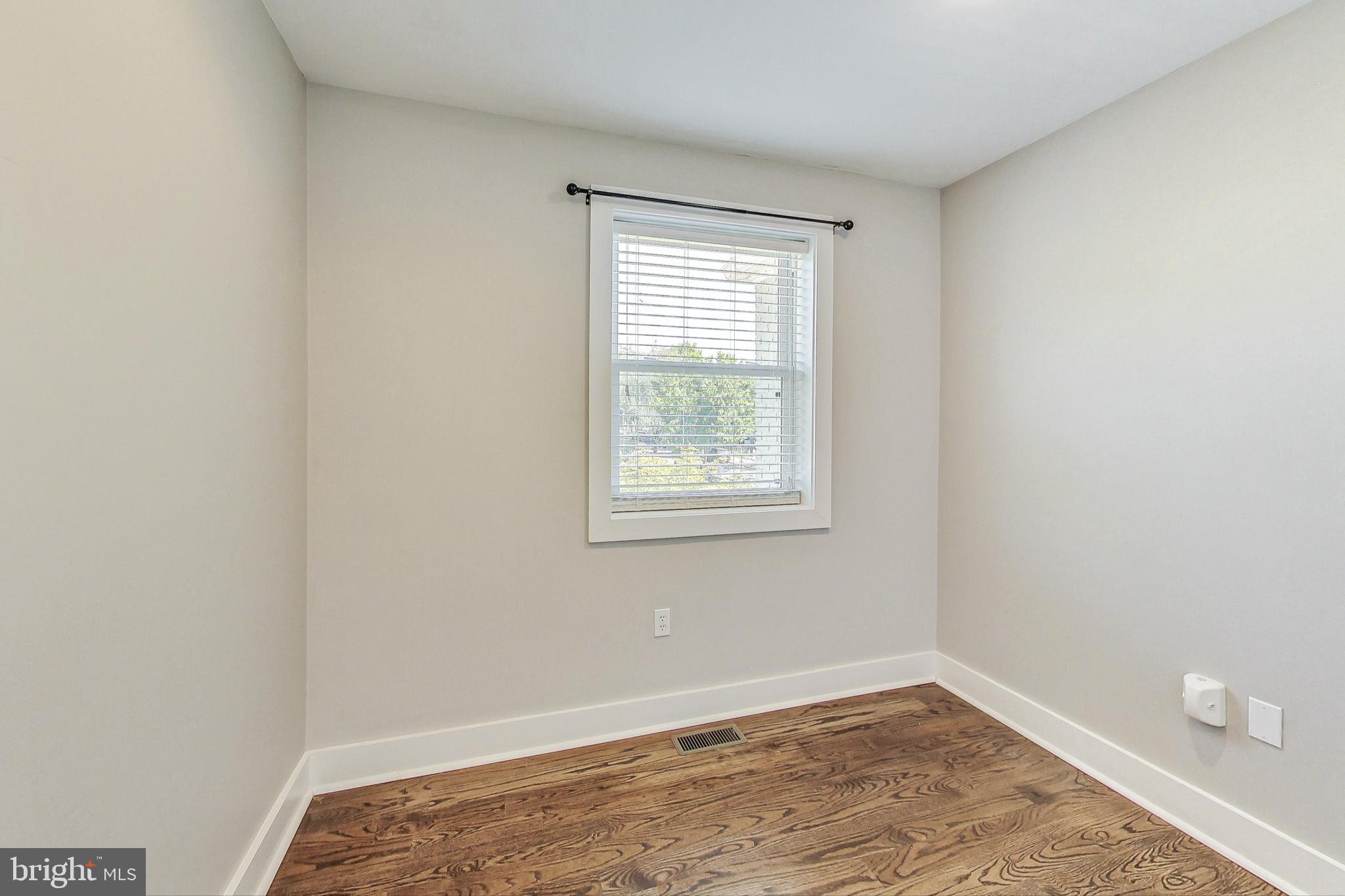 1330 Staples Street Northeast Washington, DC 20002 - Photo 27 of 64 an empty room with a window
