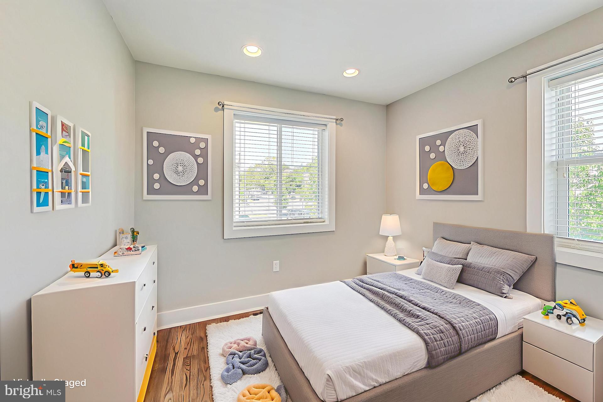 1330 Staples Street Northeast Washington, DC 20002 - Photo 32 of 64 a bedroom with a bed and a window