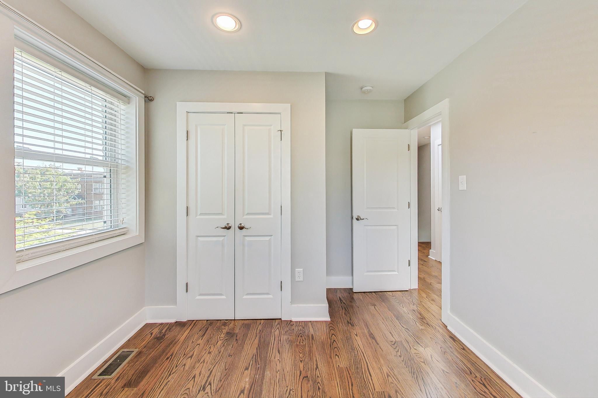 1330 Staples Street Northeast Washington, DC 20002 - Photo 34 of 64 a view of room with window and wooden floor