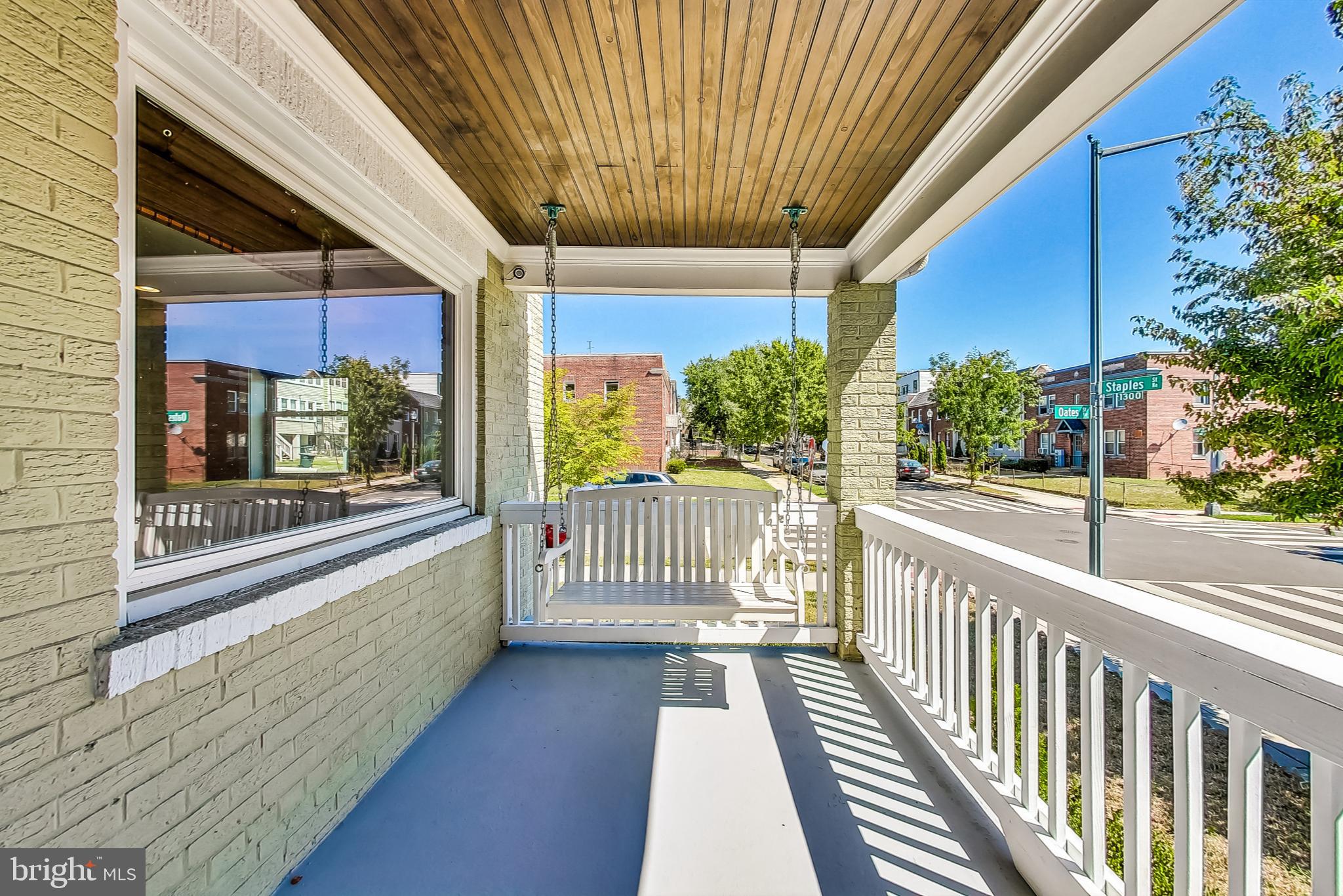 1330 Staples Street Northeast Washington, DC 20002 - Photo 4 of 64 a view of a room with wooden floor and iron stairs