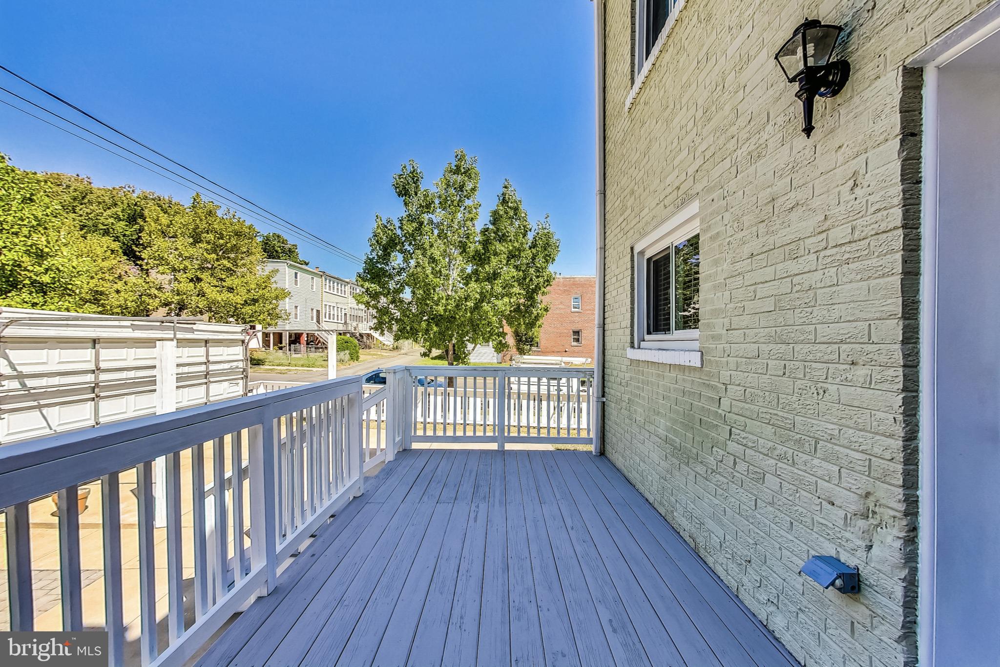 1330 Staples Street Northeast Washington, DC 20002 - Photo 52 of 64 a view of a balcony with wooden floor