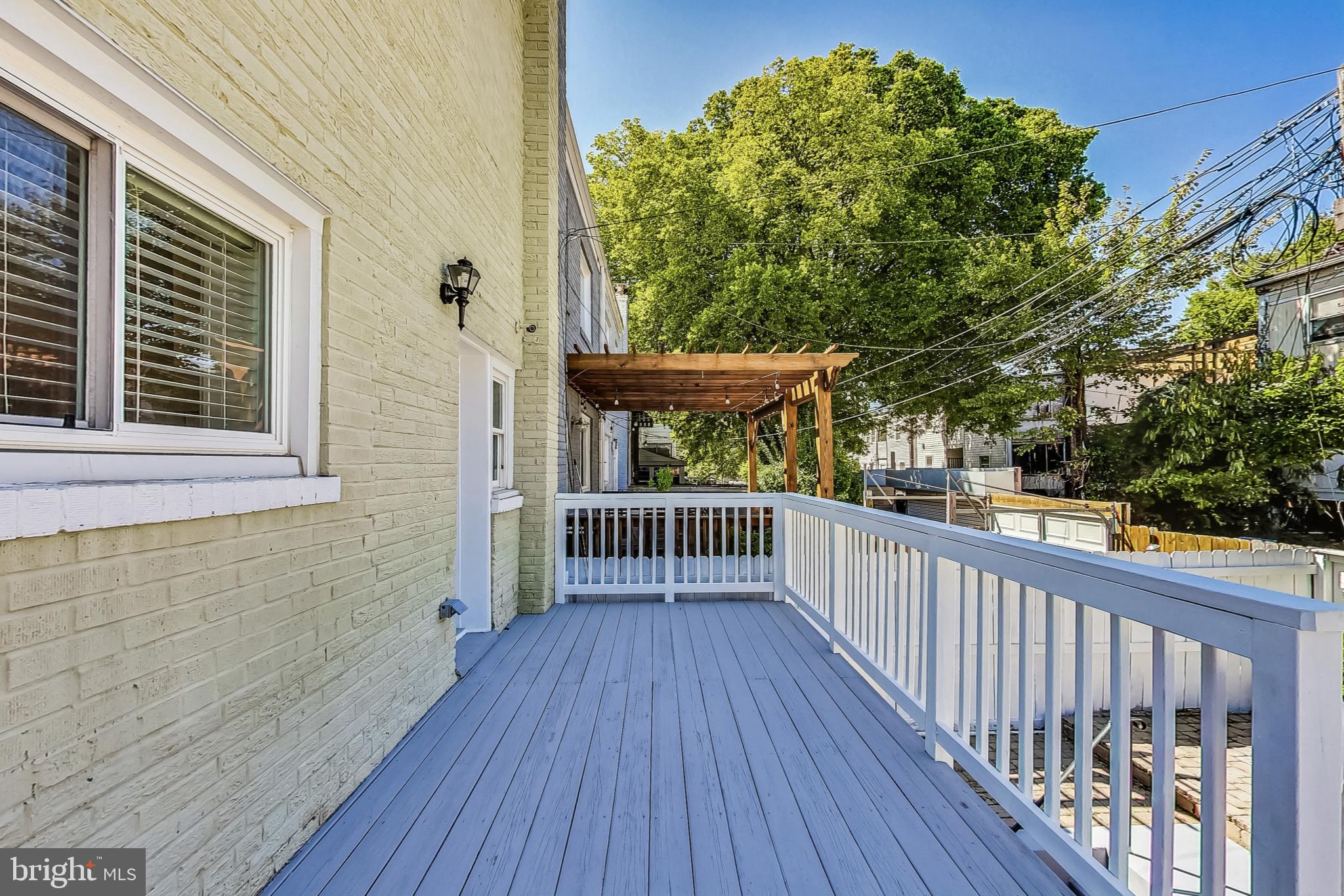 1330 Staples Street Northeast Washington, DC 20002 - Photo 53 of 64 a view of a balcony with wooden floor