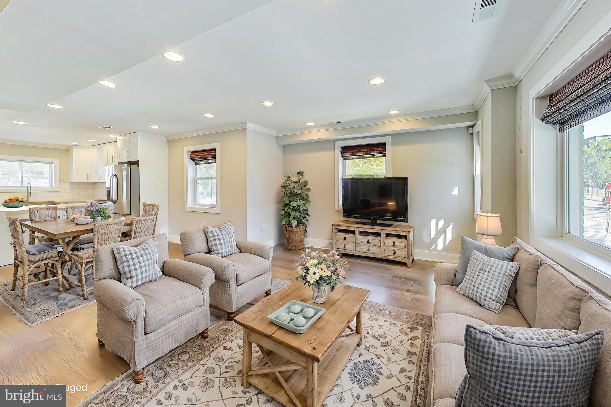 1330 Staples Street Northeast Washington, DC 20002 - Photo 8 of 64 a living room with furniture and a flat screen tv