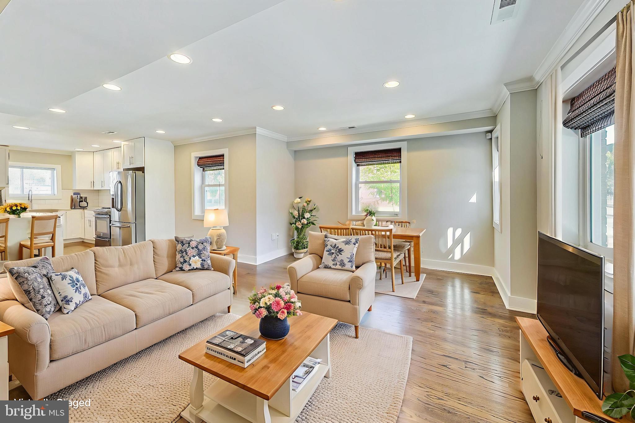 1330 Staples Street Northeast Washington, DC 20002 - Photo 9 of 64 a living room with furniture and a flat screen tv