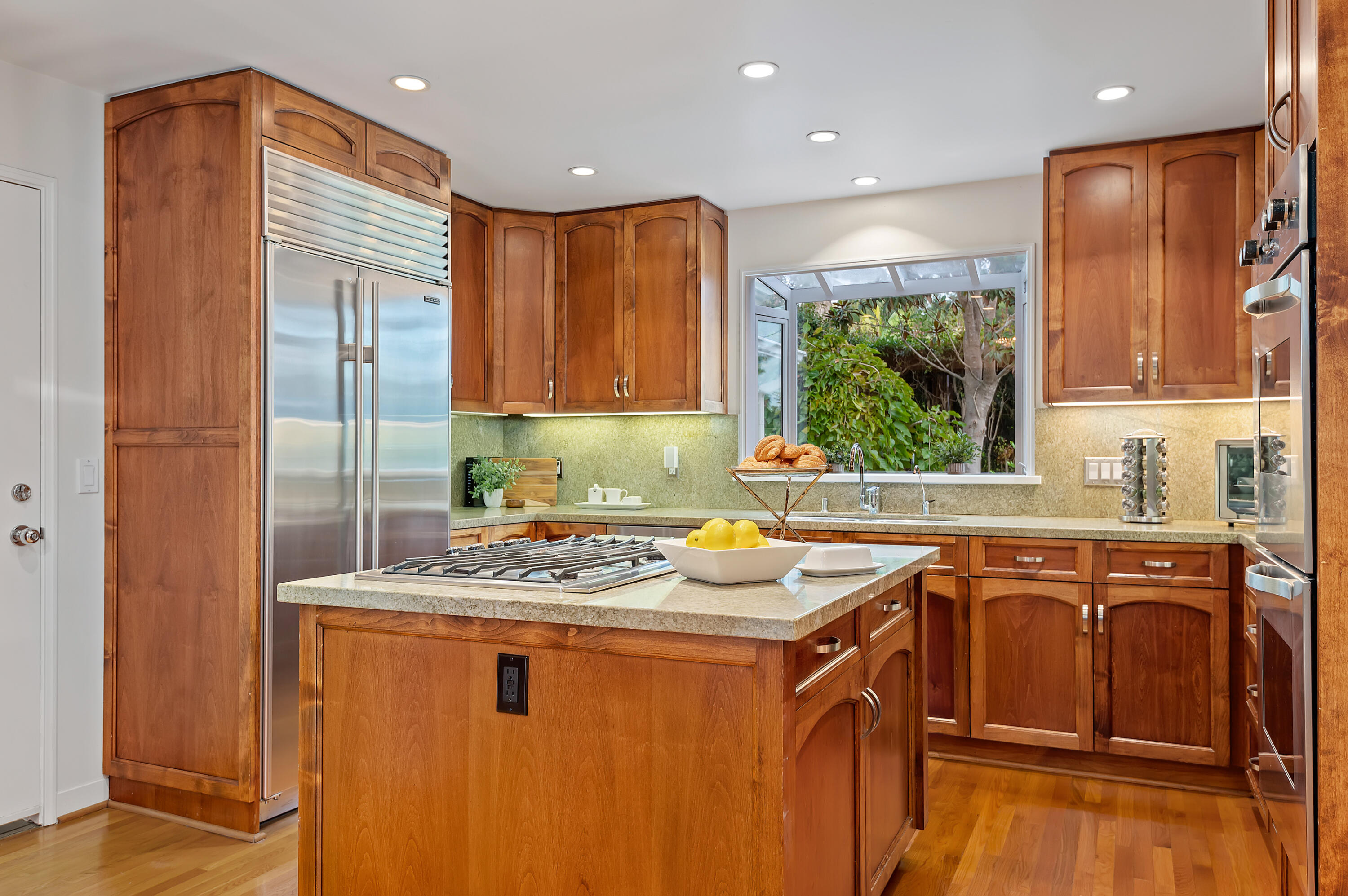 189 Hermosillo Road Montecito, CA 93108 - Photo 12 of 47 a kitchen with stainless steel appliances granite countertop a sink stove and refrigerator