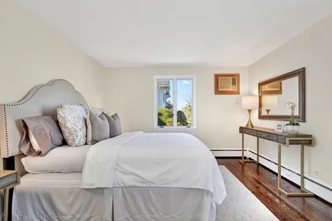 a bed room with a bed and a couch