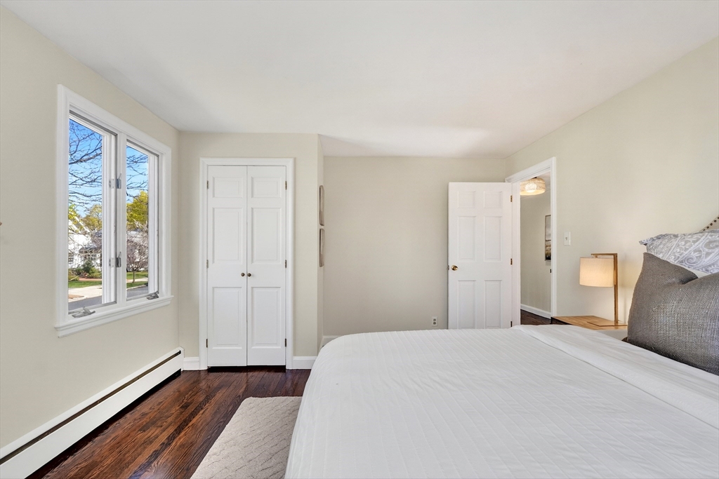 26 Garfield Road Melrose, MA 02176 - Photo 21 of 42 a bedroom with a bed and a window