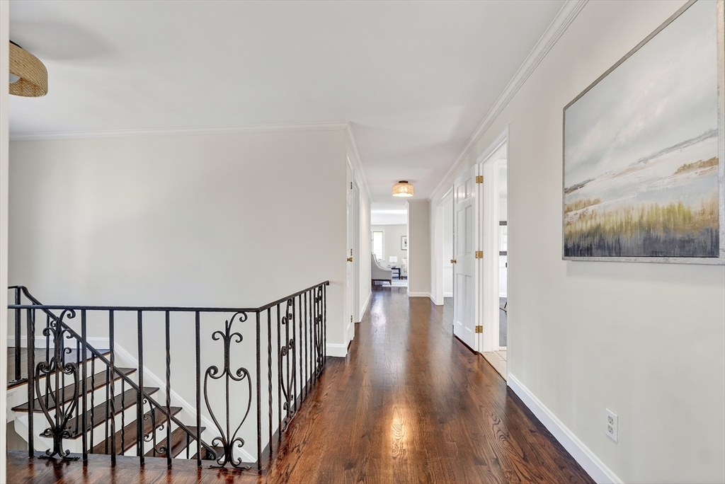 26 Garfield Road Melrose, MA 02176 - Photo 23 of 42 a view of a hallway with wooden floor