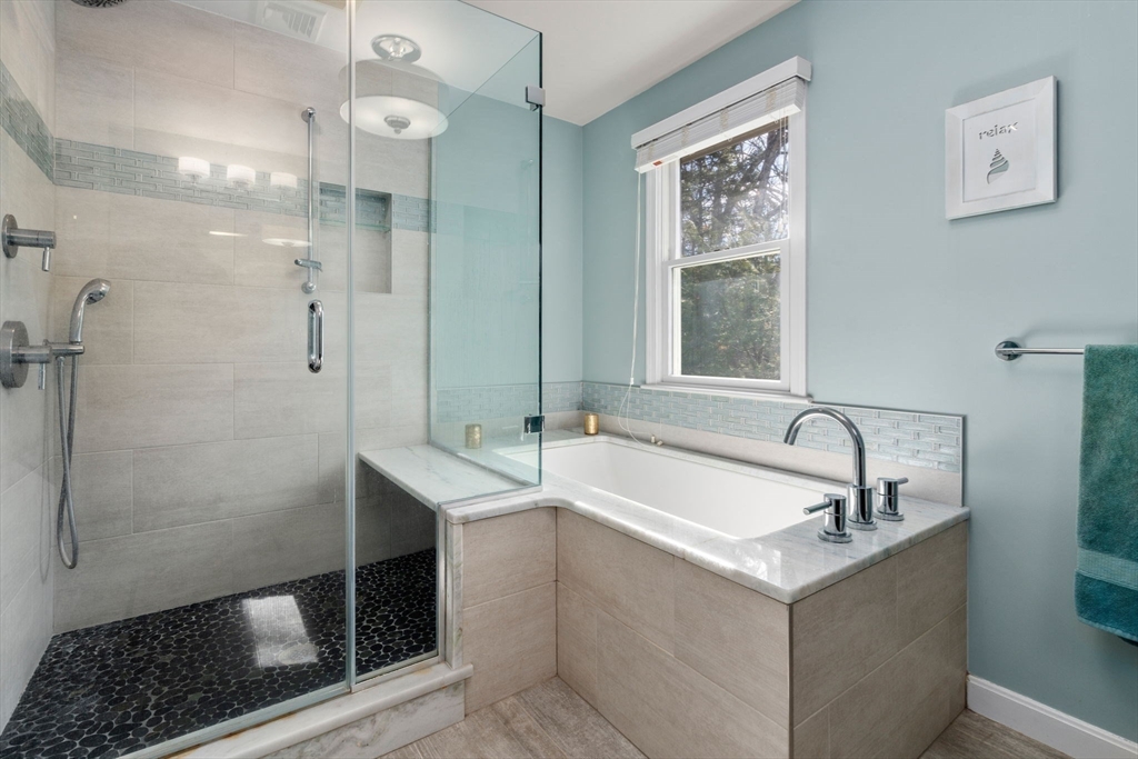 88 Robinwood Avenue Needham, MA 02492 - Photo 17 of 29 a bathroom with a sink and a mirror