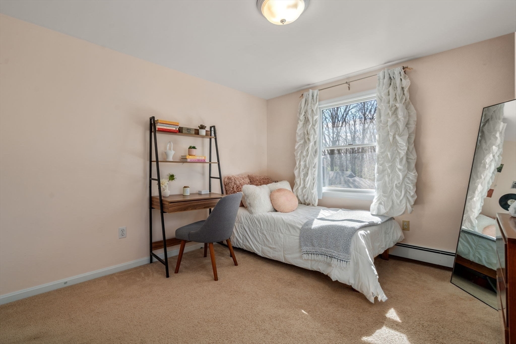 88 Robinwood Avenue Needham, MA 02492 - Photo 19 of 29 a bedroom with a bed and a window