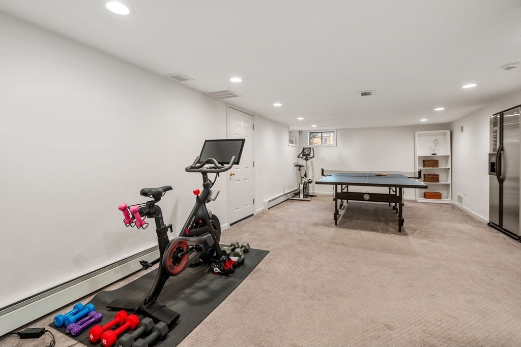 88 Robinwood Avenue Needham, MA 02492 - Photo 22 of 29 a view of a room with gym equipment