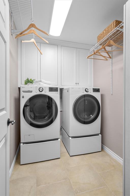 410 Simmons Road Double Oak, TX 75077 - Photo 22 of 40 Dedicated laundry room with side-by-side washer/dryer and built-in storage.