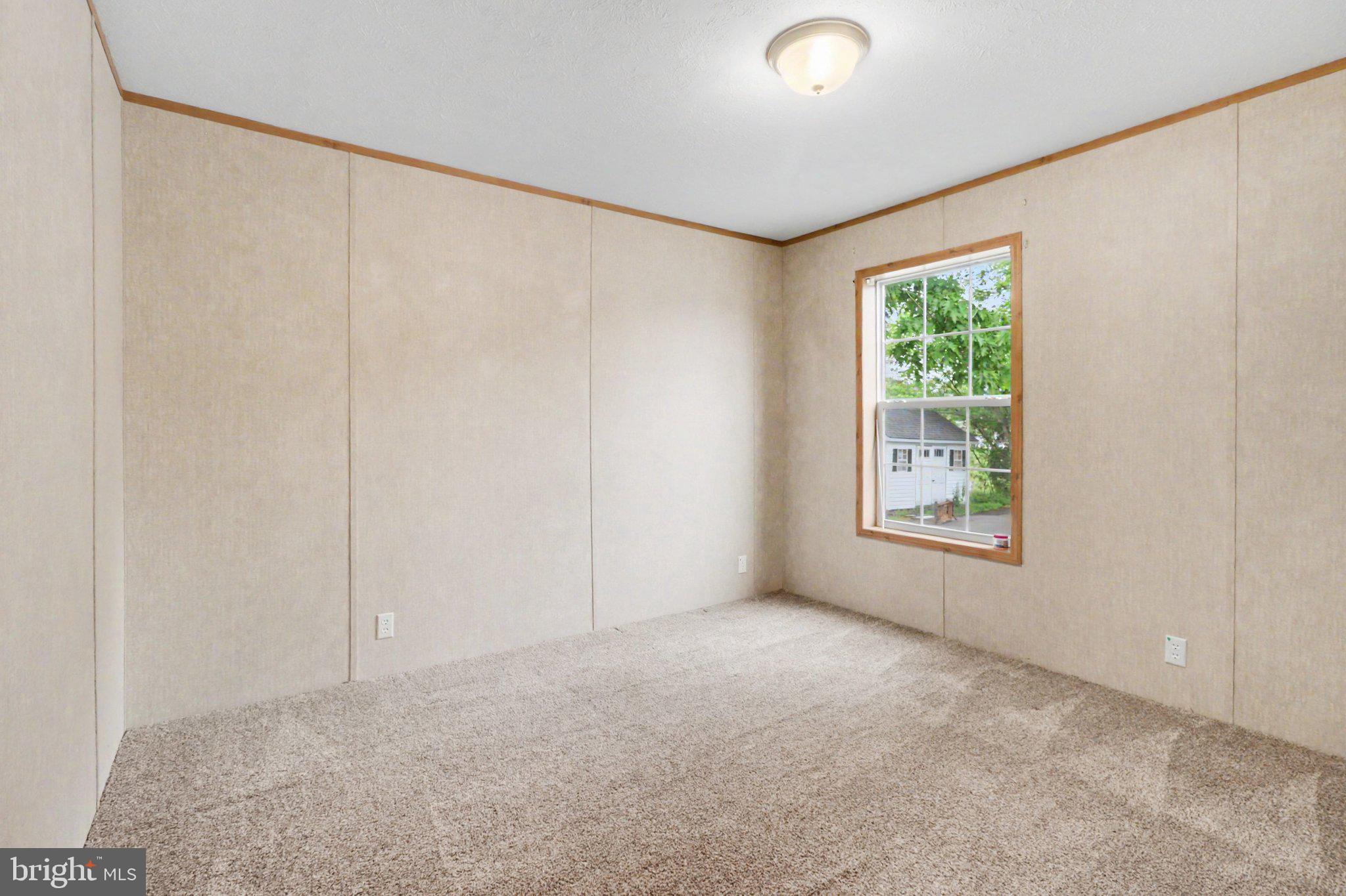 66 Kip Road Halifax, PA 17032 - Photo 8 of 16 an empty room with windows
