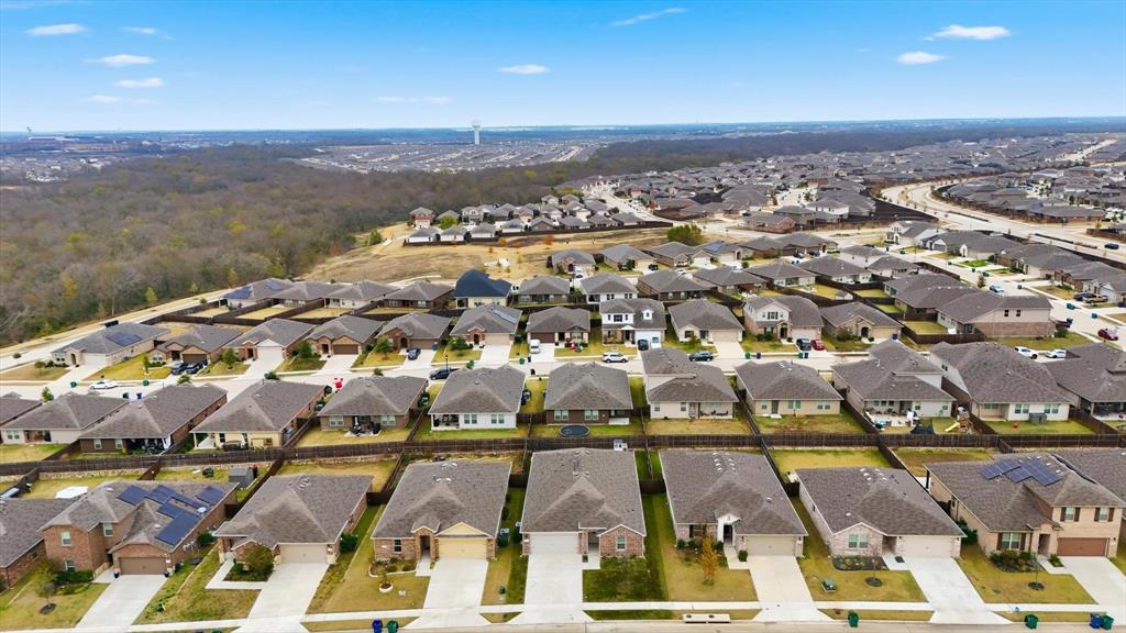 2416 Wildhaven Road Crandall, TX 75114 - Photo 30 of 35 an aerial view of residential houses with outdoor space