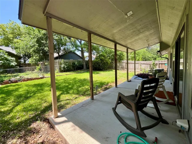 a view of a two chairs in the deck