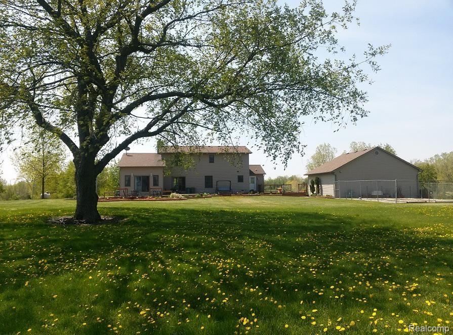 11170 Rustic Rdg Lane Fenton, MI 48430 - Photo 2 of 19 Rear View of Rustic.jpg