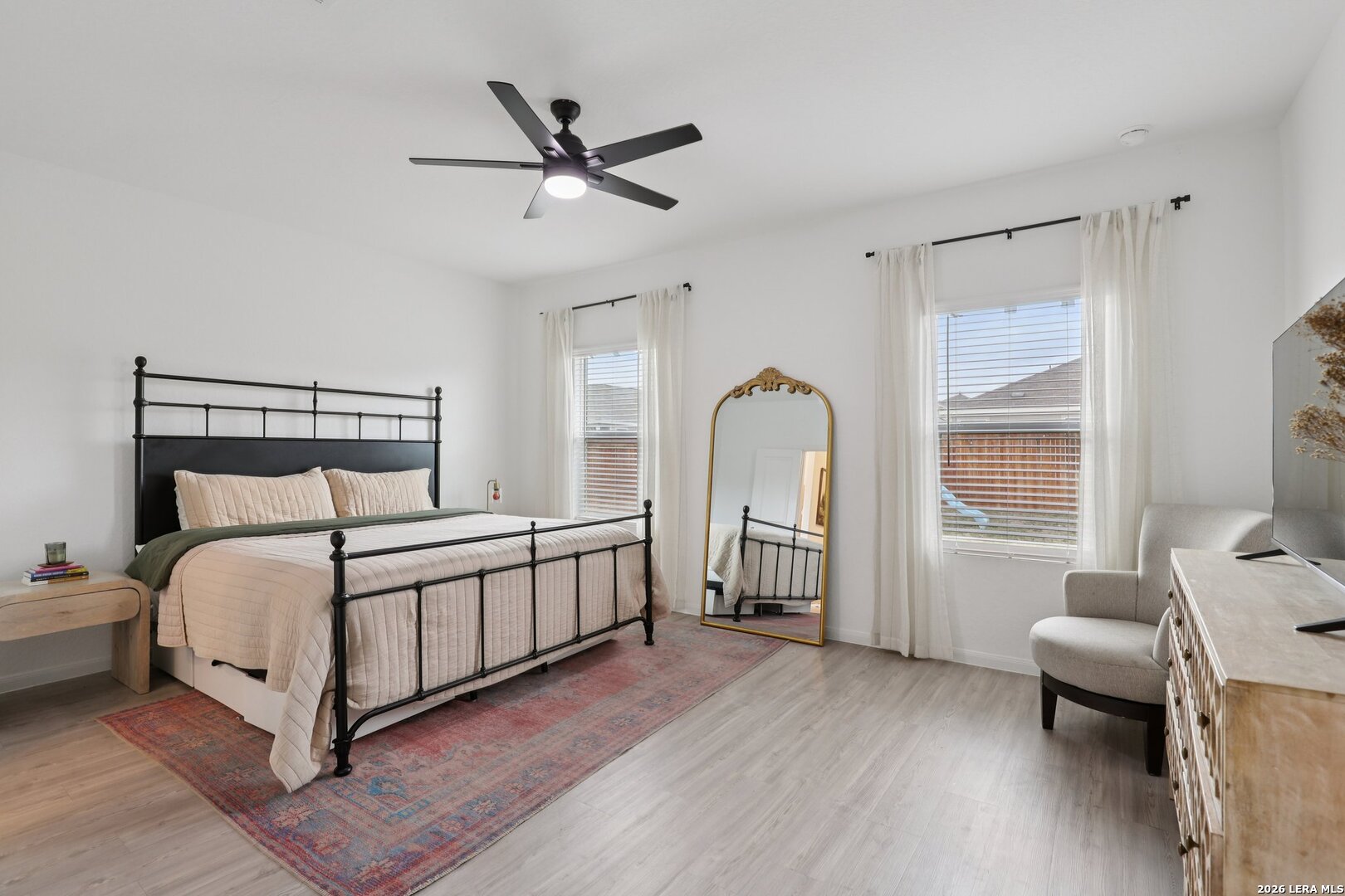 9062 Austin Seguin, TX 78155 - Photo 17 of 43 a bed room with a bed and a window