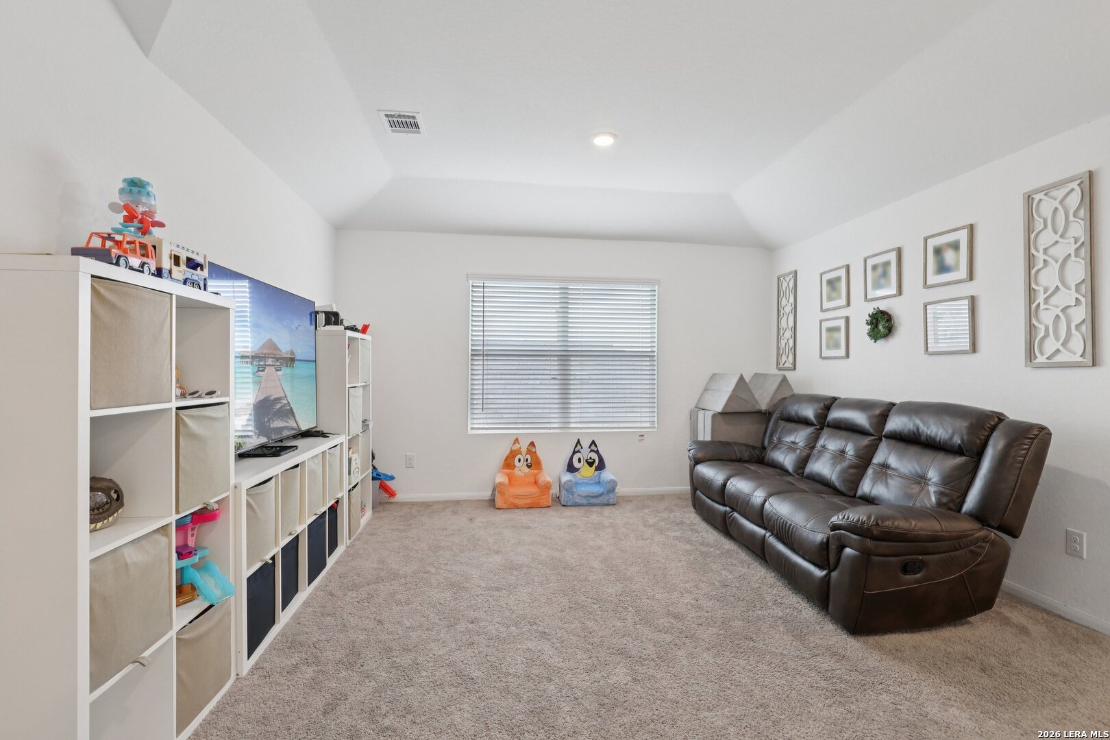 9062 Austin Seguin, TX 78155 - Photo 21 of 43 a living room with furniture and a flat screen tv