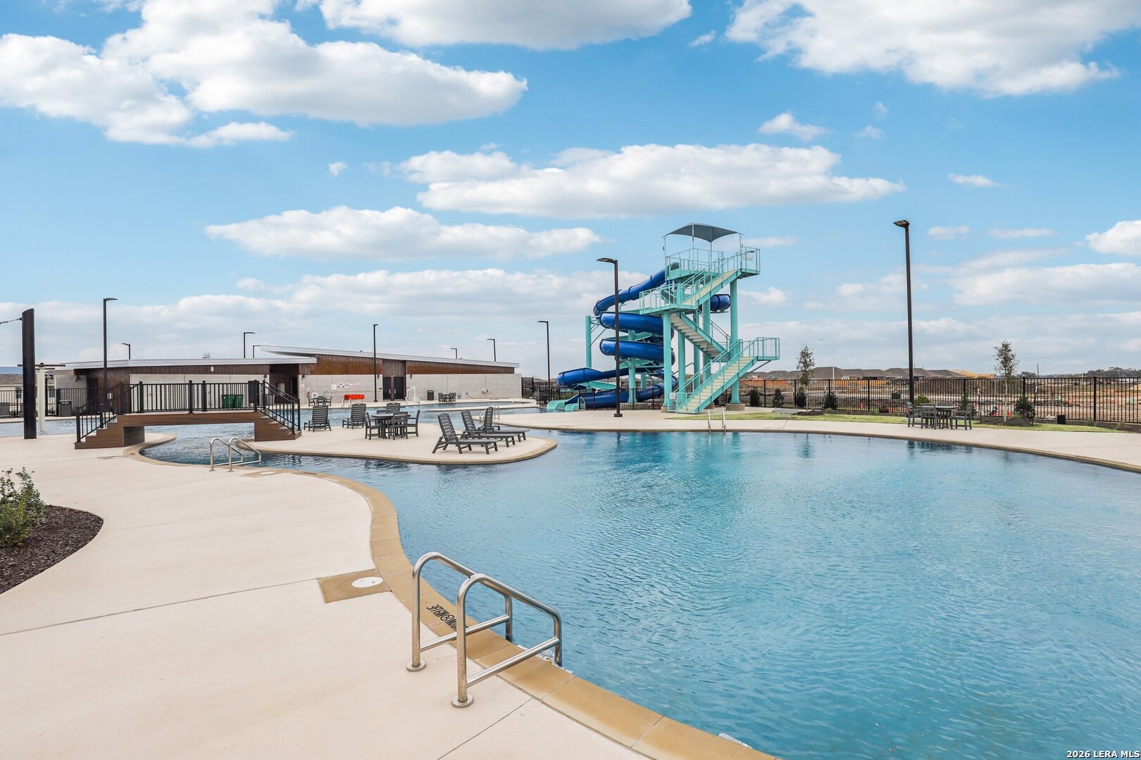 9062 Austin Seguin, TX 78155 - Photo 37 of 43 a view of a swimming pool with outdoor seating