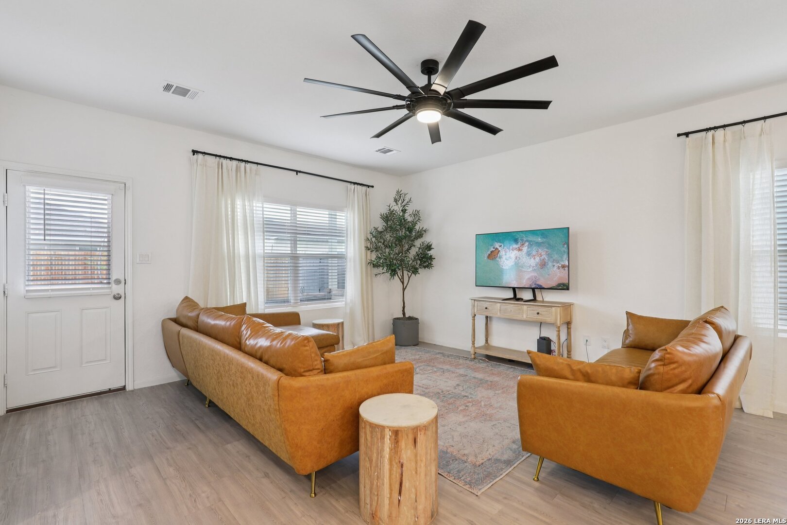 9062 Austin Seguin, TX 78155 - Photo 10 of 43 a living room with furniture and a large window