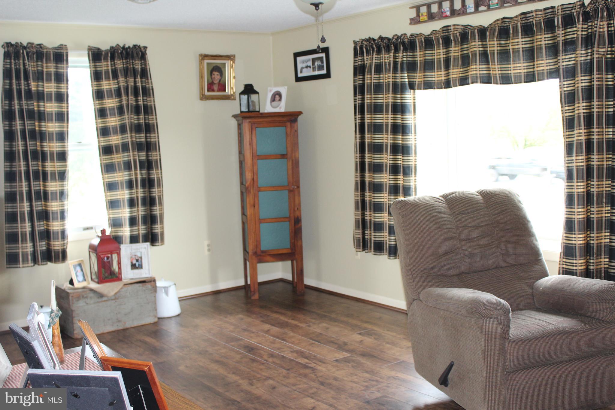 1420 Harney Road Littlestown, PA 17340 - Photo 17 of 91 Living Room at front of home