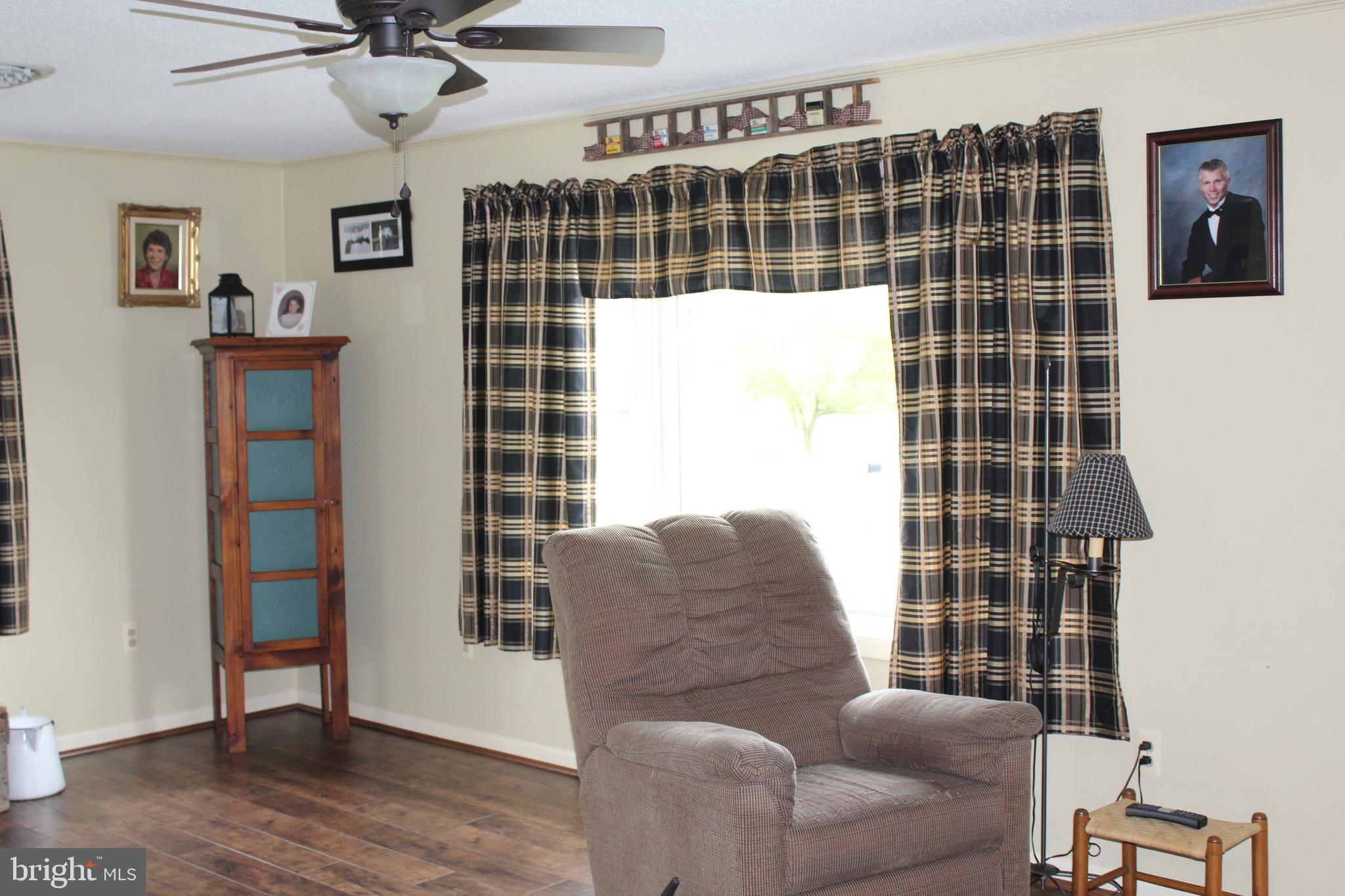 1420 Harney Road Littlestown, PA 17340 - Photo 18 of 91 Living Room - laminate flooring and large window