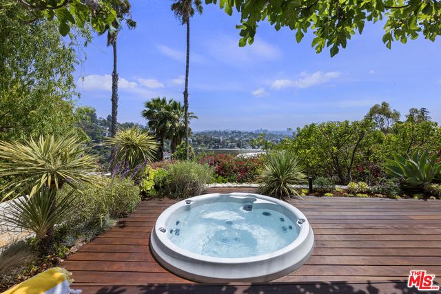 a view of a balcony with chairs