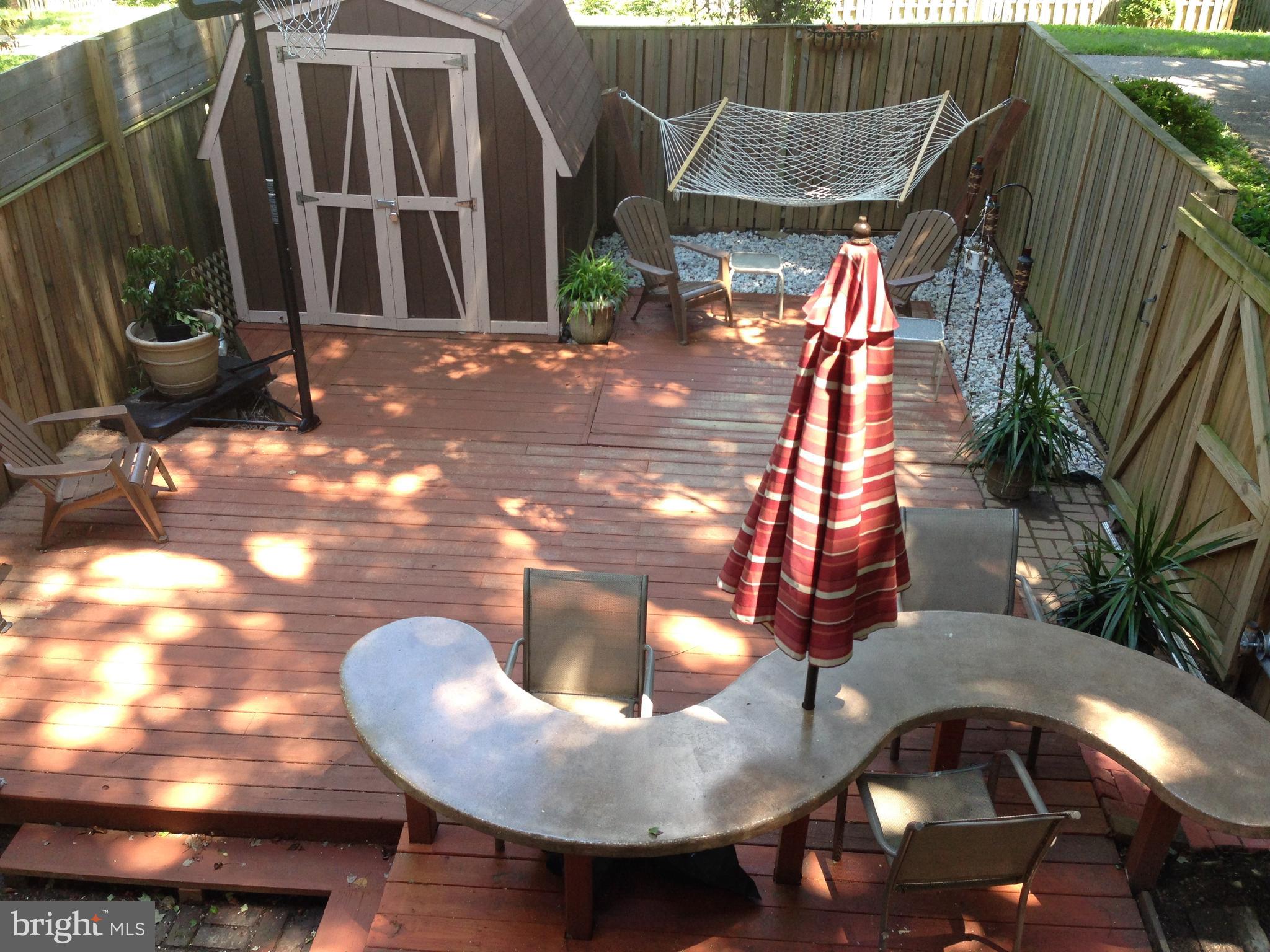 5963 Grand Banks Road Columbia, MD 21044 - Photo 13 of 16 Private back yard with custom bar