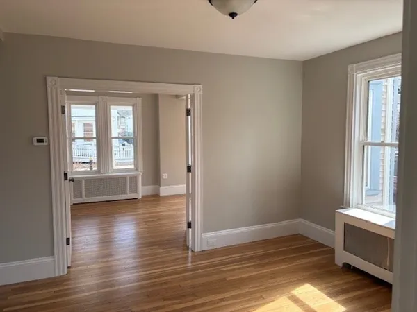 a bathroom with a shower and toilet
