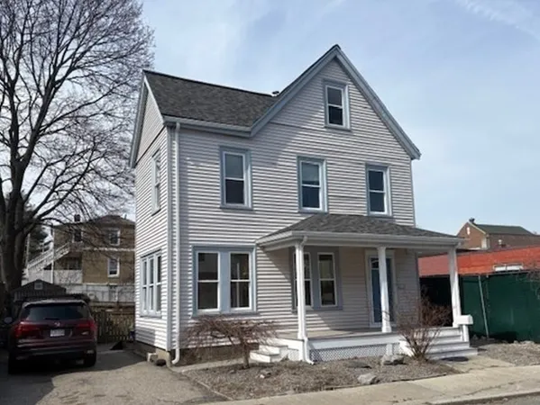 a view of a yard covered in snow