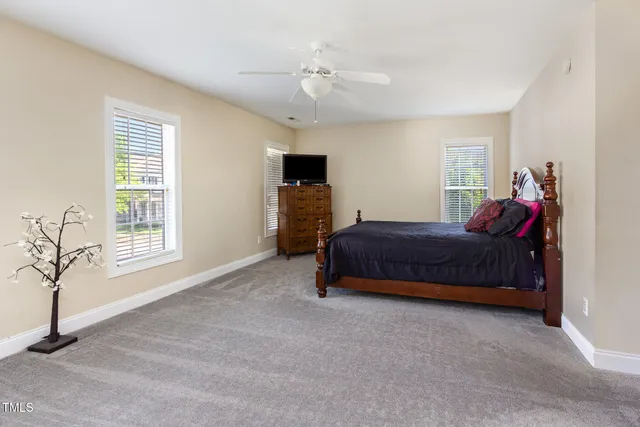 a kitchen with stainless steel appliances granite countertop a sink stove and microwave