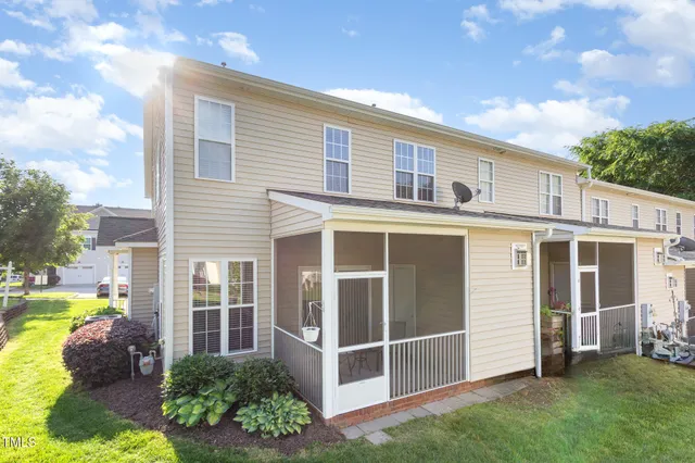a bathroom with a tub sink and a shower