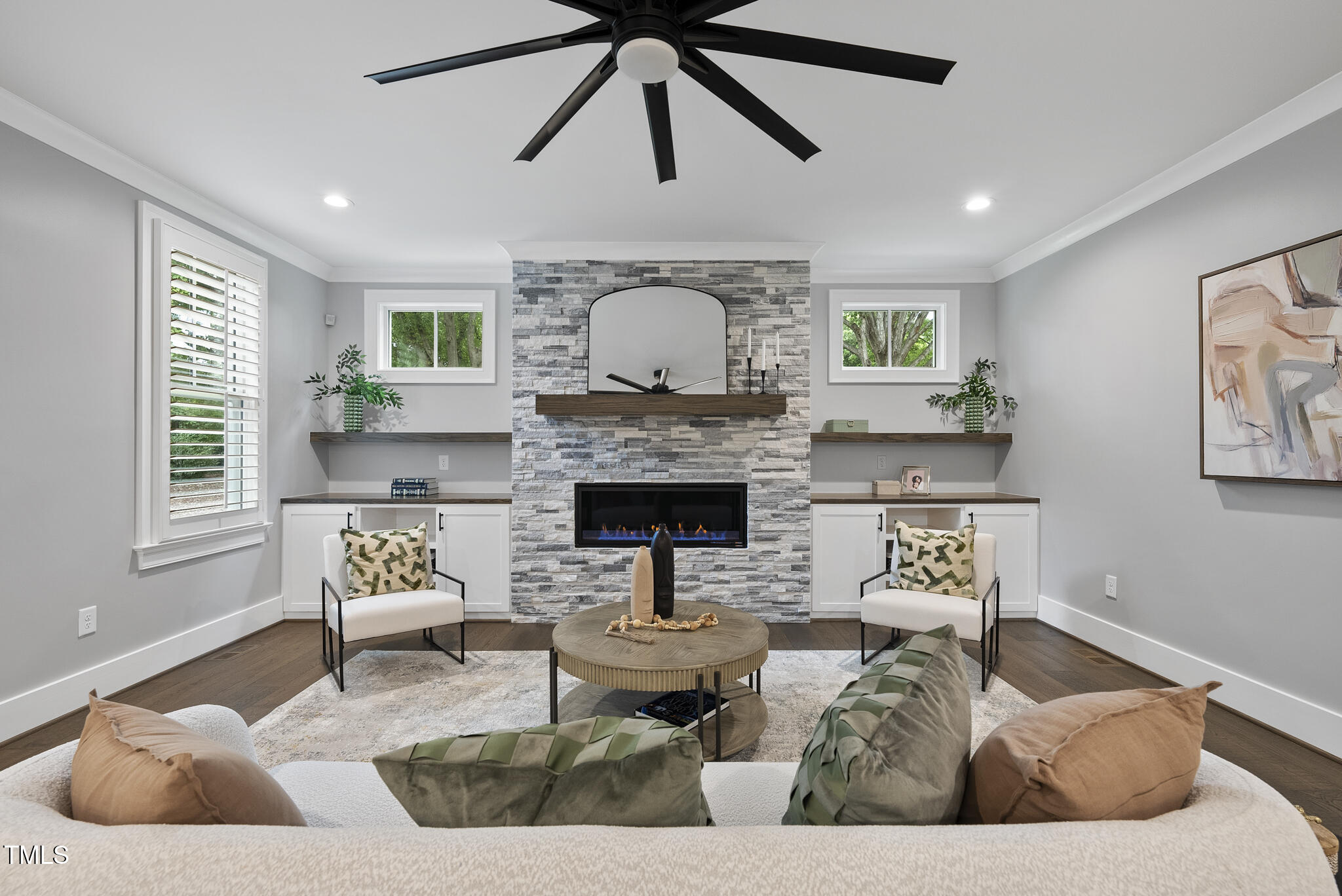125 Lord Ashley Road Raleigh, NC 27610 - Photo 31 of 85 a living room with furniture and a fireplace