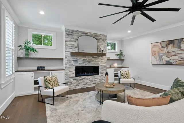 a view of a house with a tree