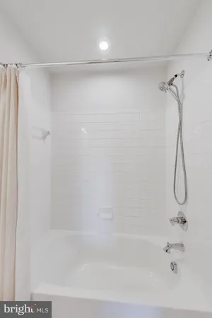 a bathroom with a bath tub