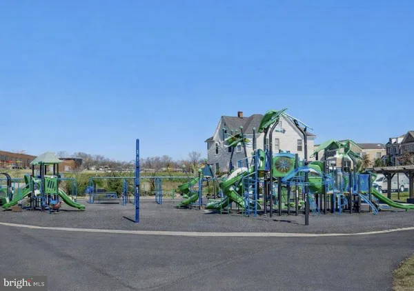 a view of a street with a building in the background