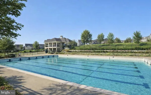 a view of a lake with a yard