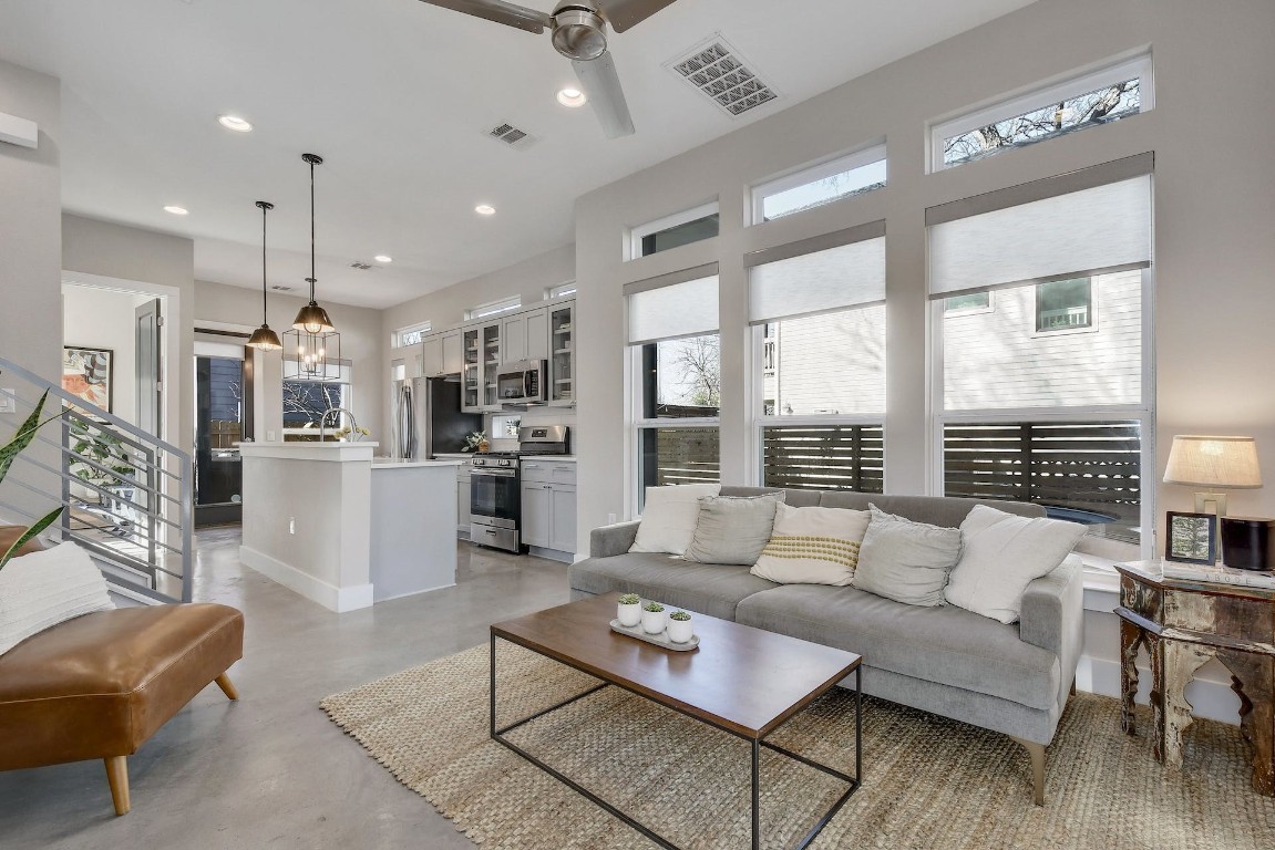 2709 East 3rd Street, Unit 2 Austin, TX 78702 - Photo 1 of 1 a living room with furniture and a large window