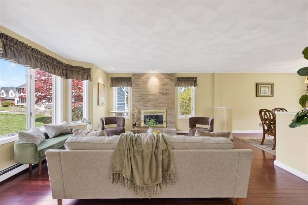 43 Hampshire Road Peabody, MA 01960 - Photo 12 of 42 a living room with furniture large window and wooden floor