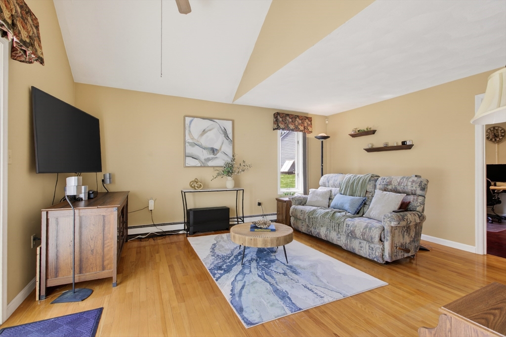 43 Hampshire Road Peabody, MA 01960 - Photo 20 of 42 a living room with furniture and a flat screen tv