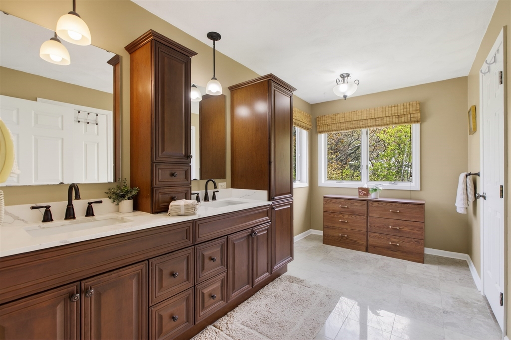 43 Hampshire Road Peabody, MA 01960 - Photo 29 of 42 a spacious bathroom with double vanity and a large mirror