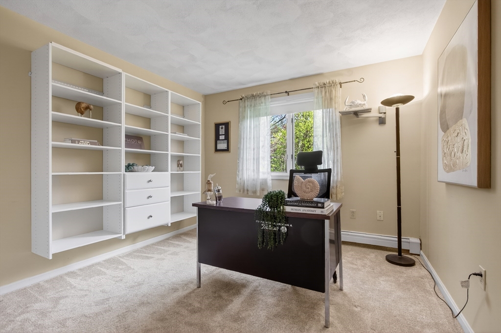 43 Hampshire Road Peabody, MA 01960 - Photo 32 of 42 a view of a workspace with furniture and windows