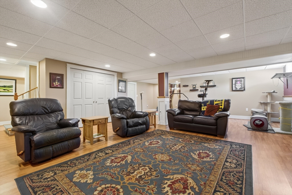 43 Hampshire Road Peabody, MA 01960 - Photo 36 of 42 a living room with furniture and a rug