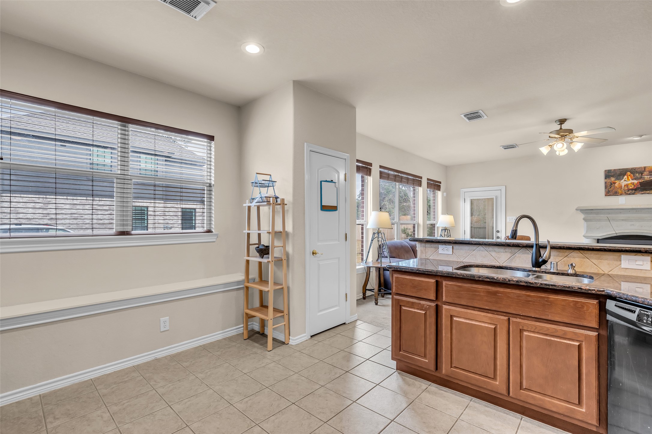 629 Spring Forest Drive Conroe, TX 77302 - Photo 21 of 38 a kitchen with a sink and cabinets