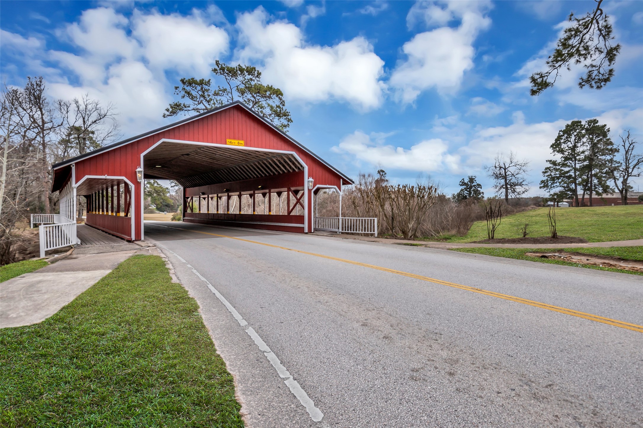 629 Spring Forest Drive Conroe, TX 77302 - Photo 32 of 38 a front view of a house with a yard and garage