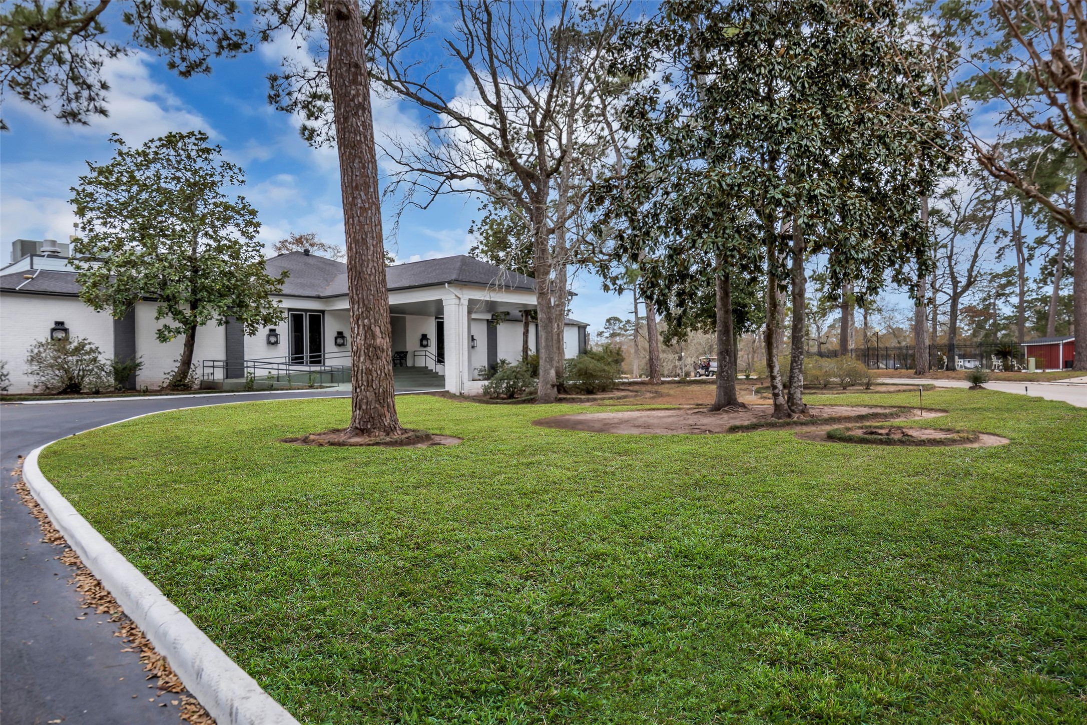 629 Spring Forest Drive Conroe, TX 77302 - Photo 33 of 38 a front view of a house with a yard